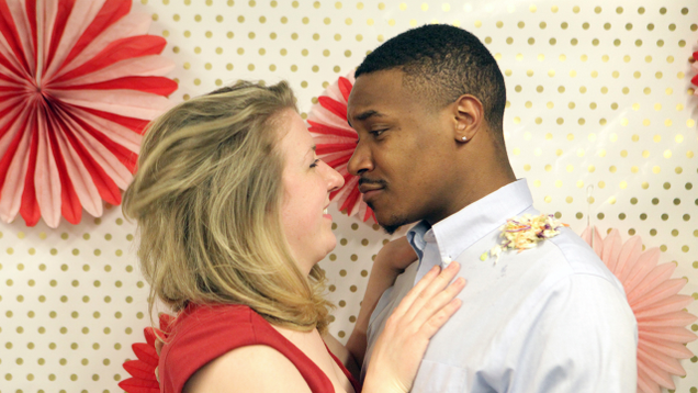 Illustration for article titled This Interracial Couple Is So Beautiful You Won’t Even Care One Of Them Has Coleslaw On His Shoulder